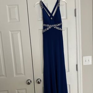 Morgan & Co. royal blue long prom dress with an open cross back. Size small.
